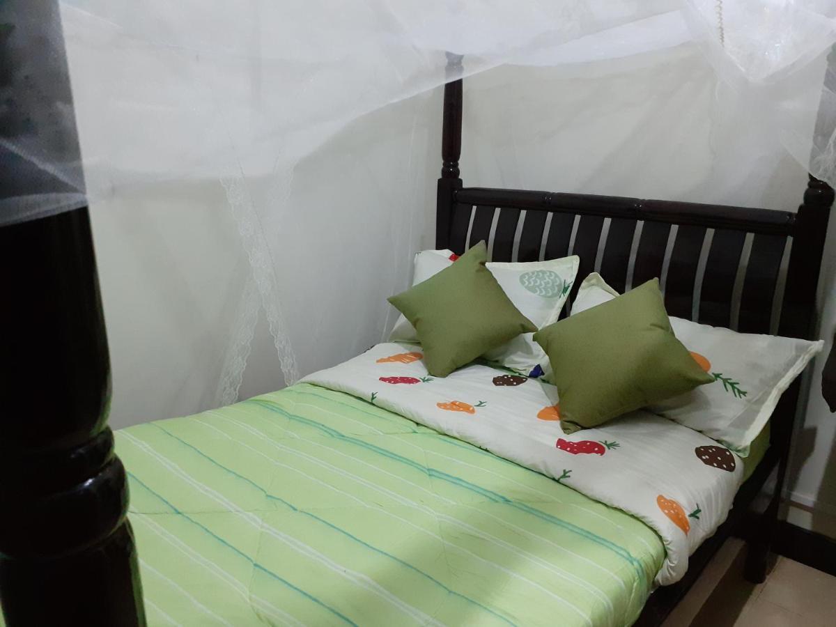 Hotel Okra House à Entebbe Extérieur photo