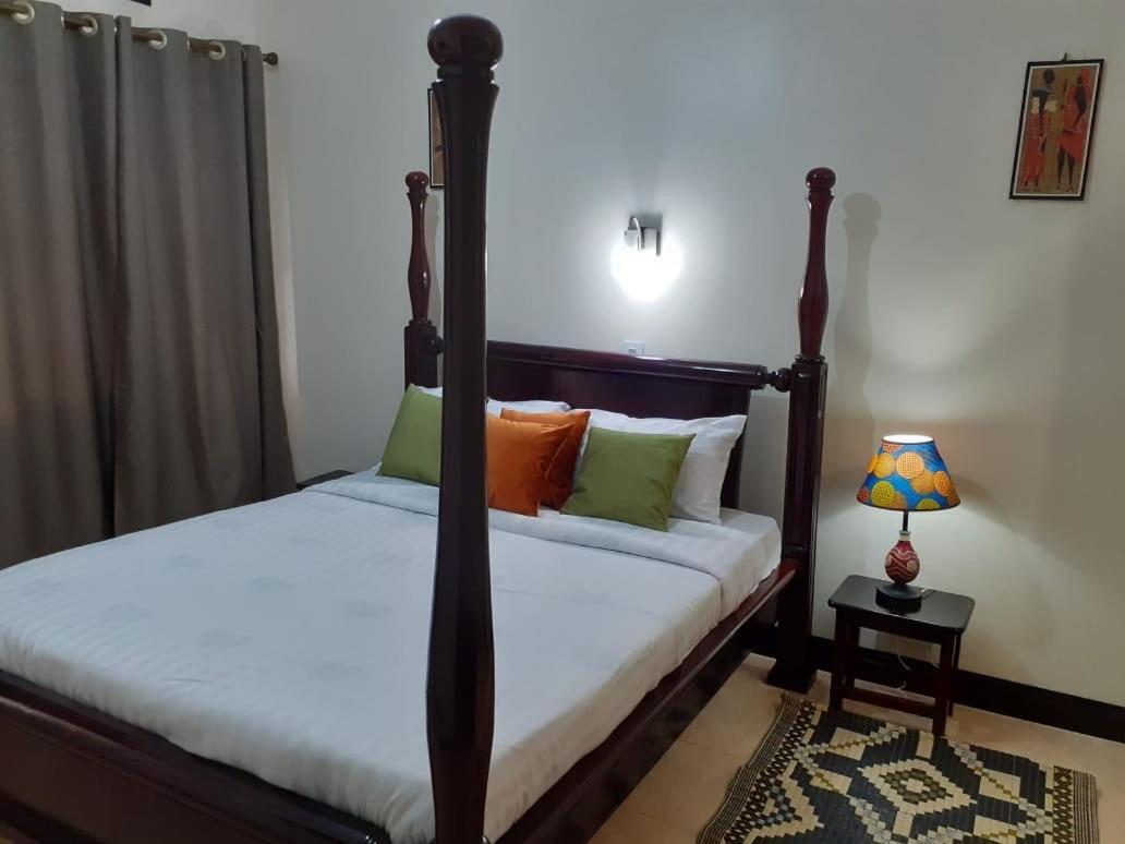 Hotel Okra House à Entebbe Extérieur photo